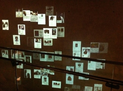 "The Missing" broadsides, projected onto a museum wall