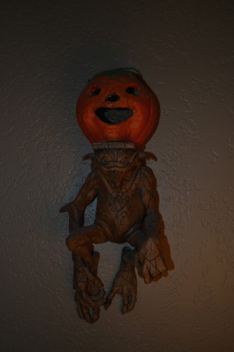 A gargoyle with a pumpkin on its head. You're welcome.