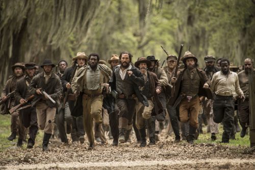 Matthew McConaughey (center) and Mahershala Ali (center left) star in THE FREE STATE OF JONES
