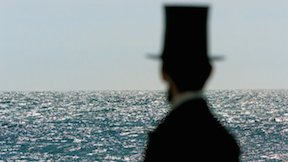 Abraham Lincoln, looking out to sea in a Lincoln MKZ commercial.
